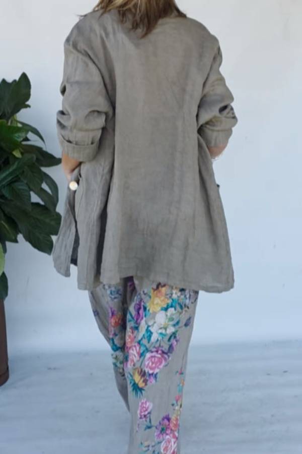 Set of green jacket and wide trousers with floral print