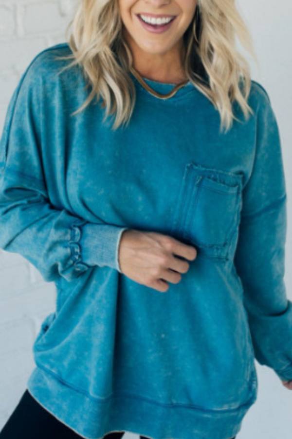 Distressed washed loose pocket sweatshirt