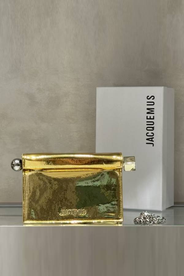 Mini clutch bag with metallic hardware