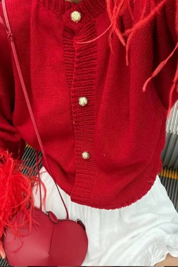 Cropped knitted cardigan with feather cuffs