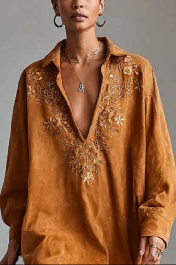 loose-fitting shirt dress with floral embroidery on the collar