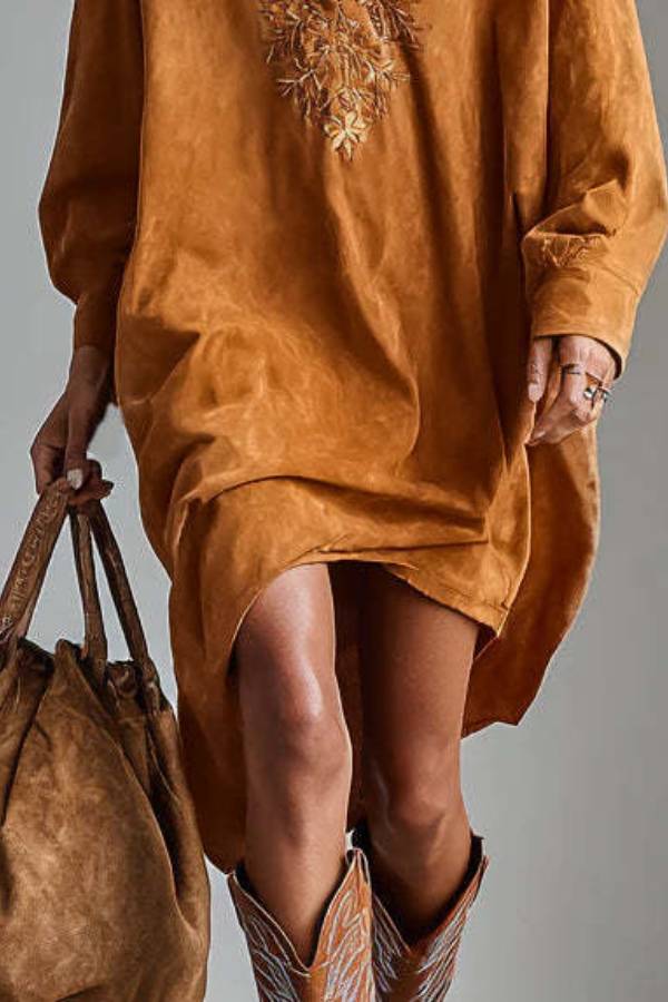 loose-fitting shirt dress with floral embroidery on the collar