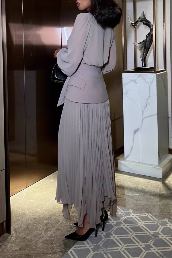 V-neck tie-waist long-sleeved top + irregular pleated long skirt two-piece set