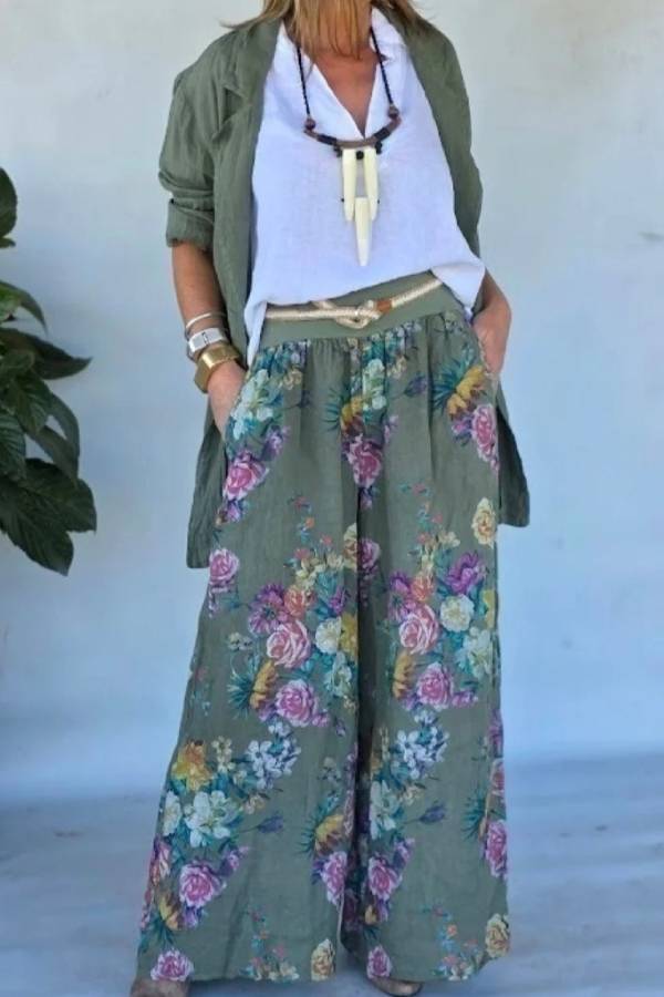 Set of green jacket and wide trousers with floral print