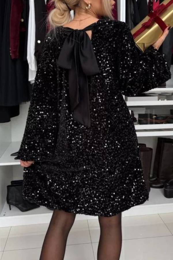 Sequined long-sleeved party dress with bow on the back